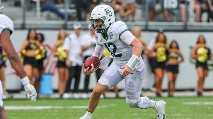 Sep 30, 2023; Orlando, Florida, USA; Baylor Bears quarterback Blake Shapen (12) runs the ball during the second quarter against the UCF Knights at FBC Mortgage Stadium.